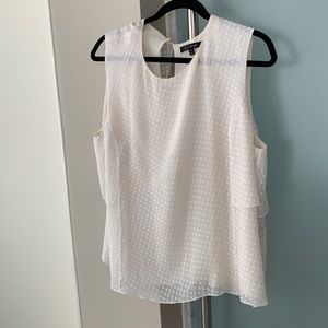 St John white sleeveless silk top.